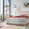 Belanoti Age Boxspringbett 180x200 Eiche 7-Zonen Taschenfederkern Matratze inkl Visco Topper Bett 180x200 in der Farbe Beige H2/H3 Polsterbett Hotelbett mit Massivholz Eiche Massivholzbett